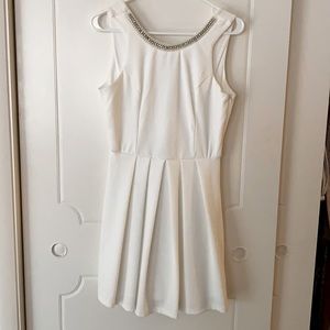 Off white dress with bead detail around neckline
